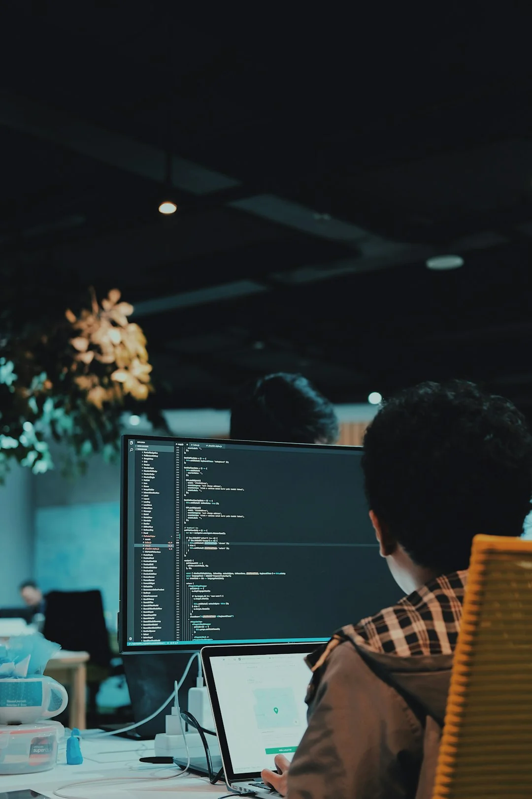 A contemporary workspace showcasing a laptop, tablet, and smartphones, ideal for tech and freelance use.